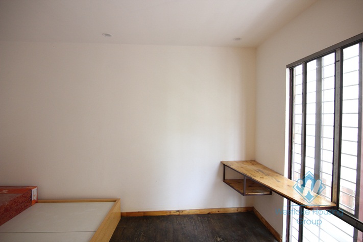 Tiny artisan's house with a balcony for rent in Tay Ho